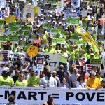Thousands of protesters march during the