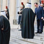 French President Francois Hollande welcomes a Qatari delegation at the Elysee Palace before attending a solidarity march in the streets of Paris