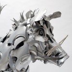 Brighton artist creates sculptures from car hubcaps