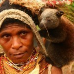 Baby_tree_kangaroo_on_the_chiefs_wifes_shoulder_-Papua_New_Guinea-17Oct2008
