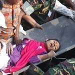 Bangladeshi rescuers retrieve garment wo