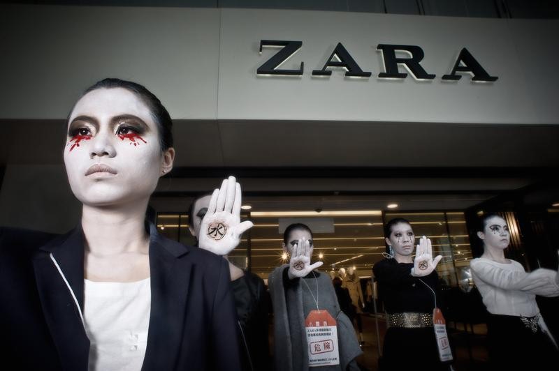 Activists dressed as 'revolting mannequins' in Taipei, through street theatre demand Zara 'Detox' now. During a day of action worldwide, 700 Greenpeace activists in over 80 cities demand that the worlds largest fashion retailer, Zara, eliminate all hazardous chemical from its clothing and supply chains.