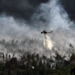 helicopter-dropping-water-595422_1920