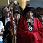 Women march in during the closing ceremony of the National Inquiry into Missing and Murdered Indigenous Women and Girls in Gatineau