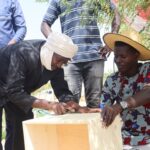 Oumar Diallo Al Foutiyou en train de suivre une formation de M Ly