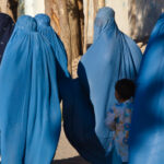 Women_in_burqa_with_their_children_in_Herat,_Afghanistan